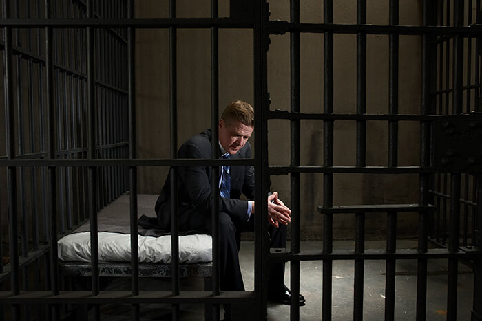 business man in jail